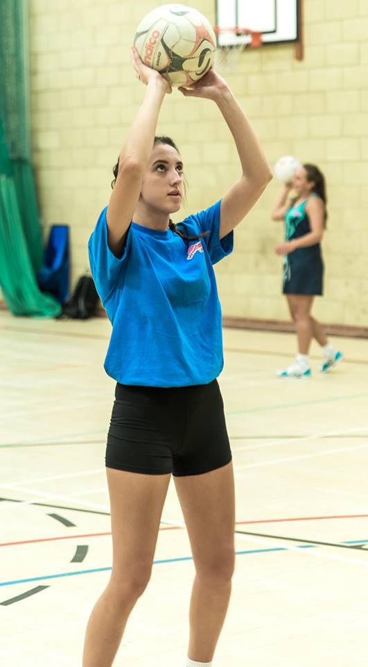 Woman catch the ball.