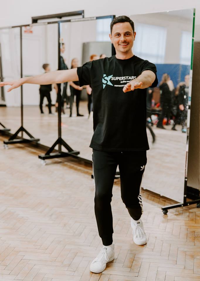 Christian in position of dance.
