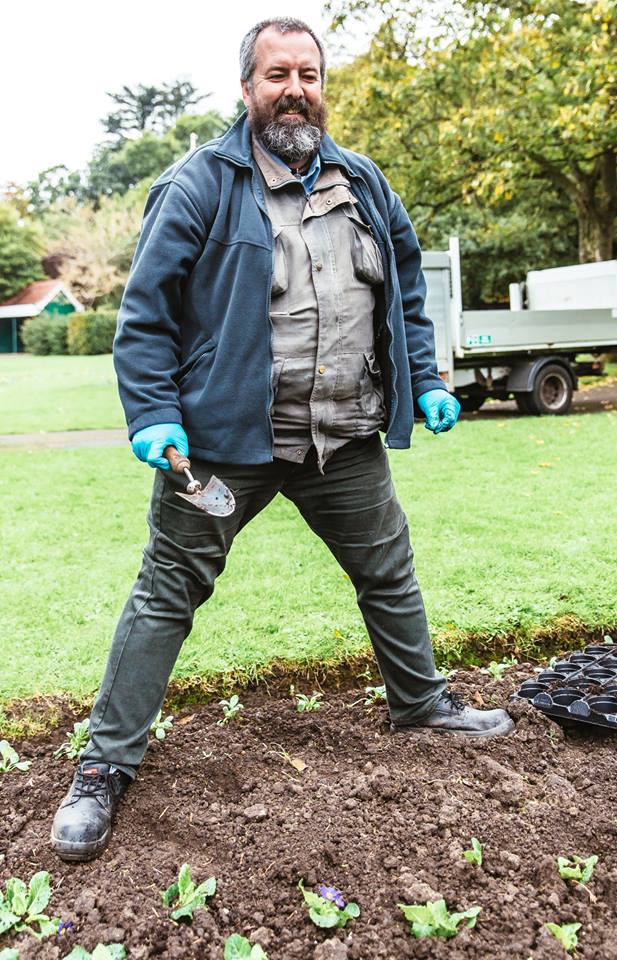 The happiness that the man is doing his work.