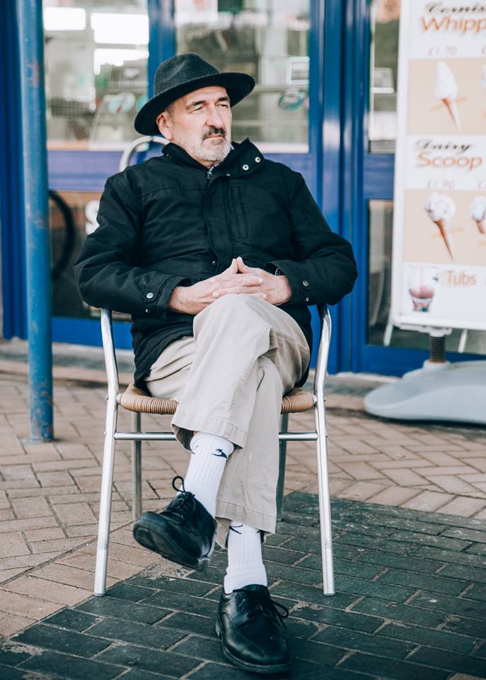 Giovanni Giacomo with crossed legs.