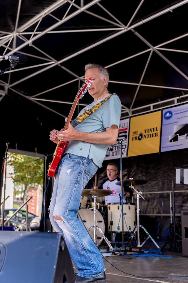 Guitarist playing.